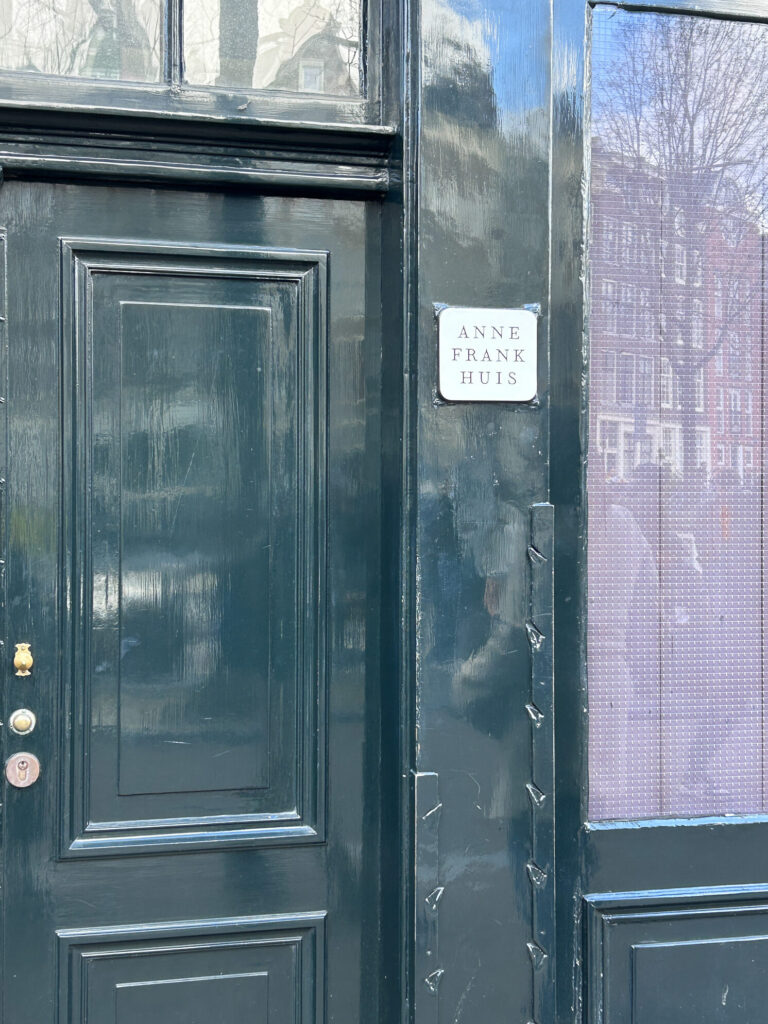 Anne Frank's house main door with a sign written Anne Frank Huis